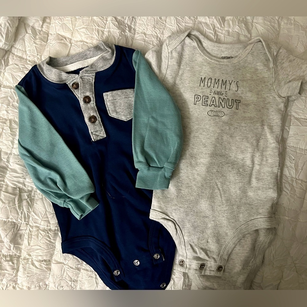 Baby onesies. Both 6m one long sleeve and one short sleeve. Carter’s brand
